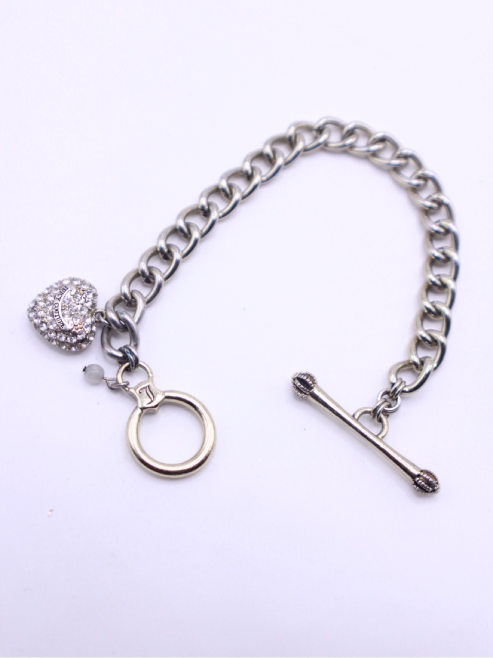 Juicy Couture Silver and gold tone clasp Heart Charm Toggle Bracelet